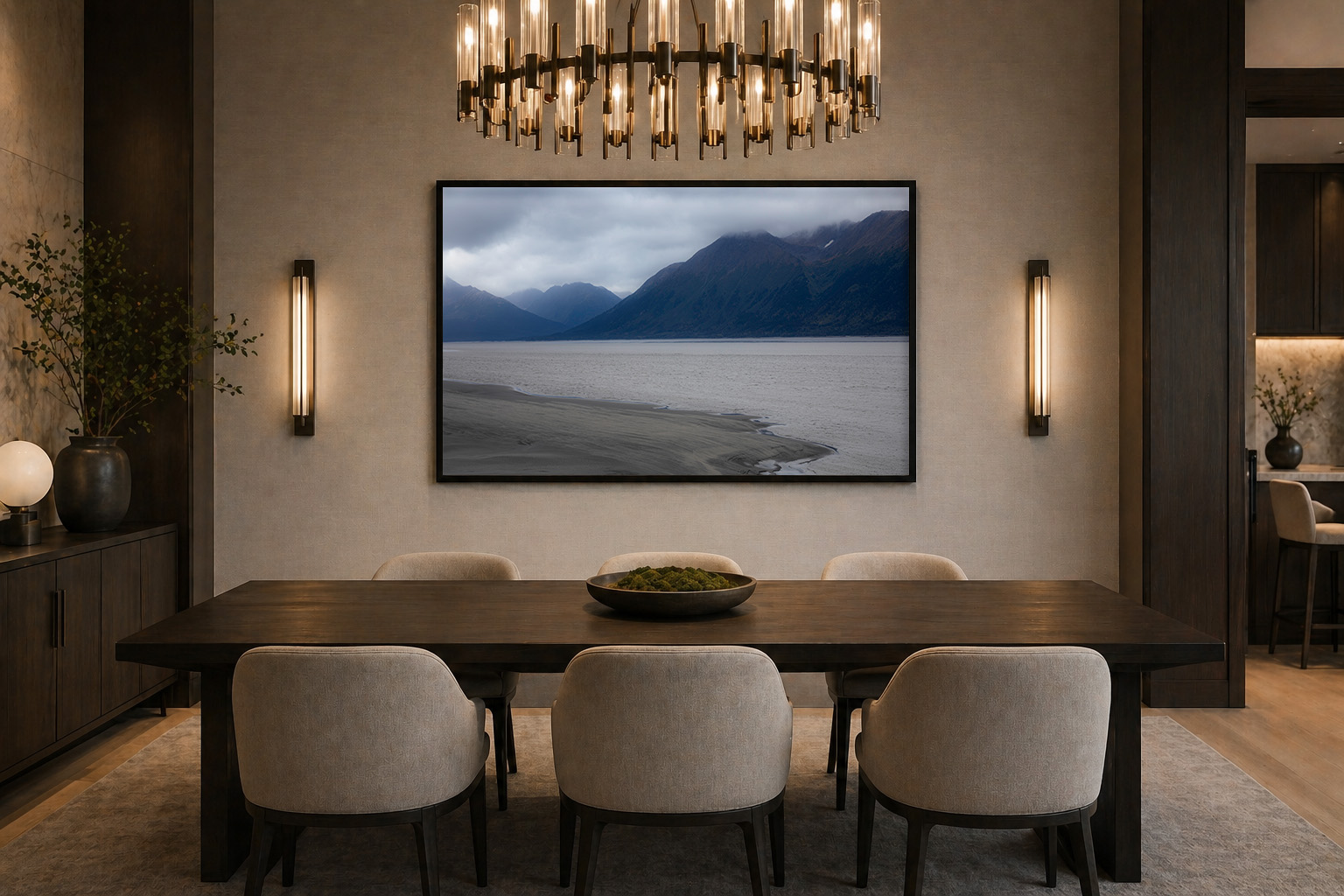 Luxury modern dining room with large framed dreamy Alaska landscape by Dan Sproul — black frame dramatic lighting